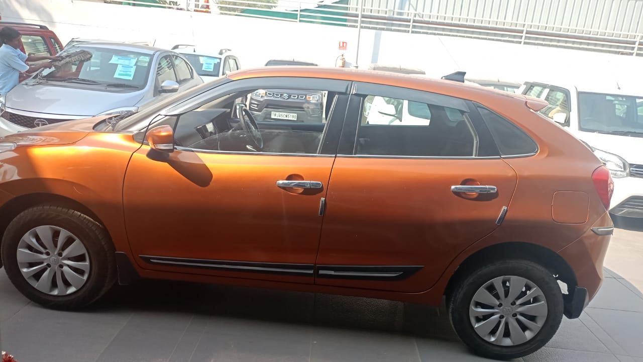 Maruti Suzuki Baleno Delta - Orange