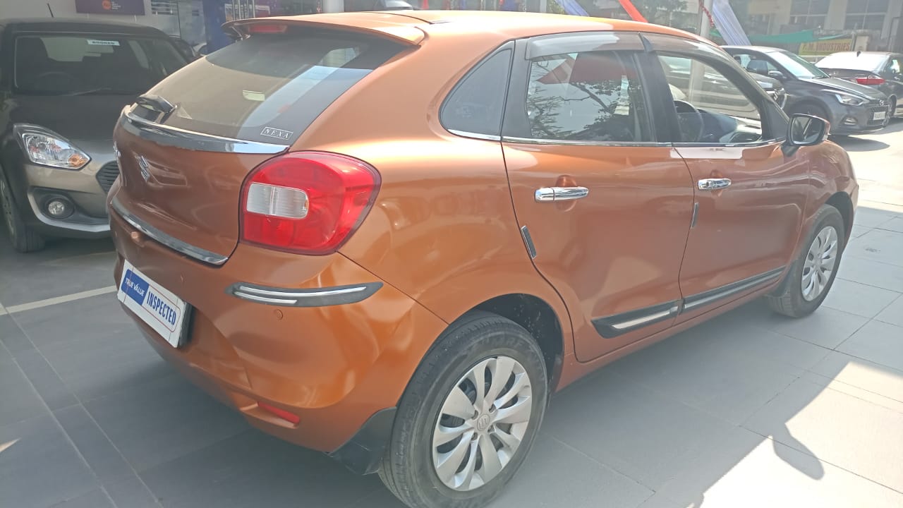 Maruti Suzuki Baleno Delta - Orange