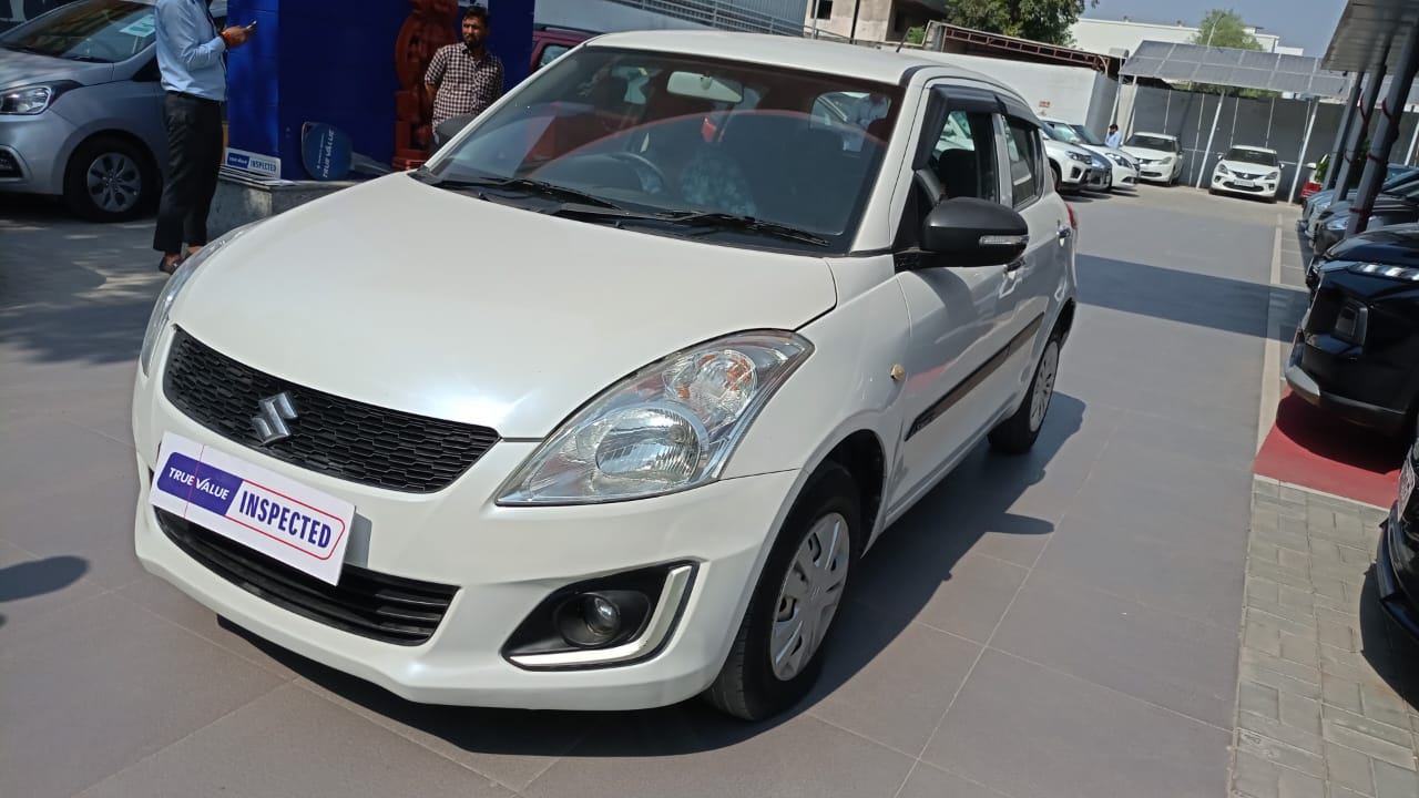 Maruti Suzuki Swift Lxi- White