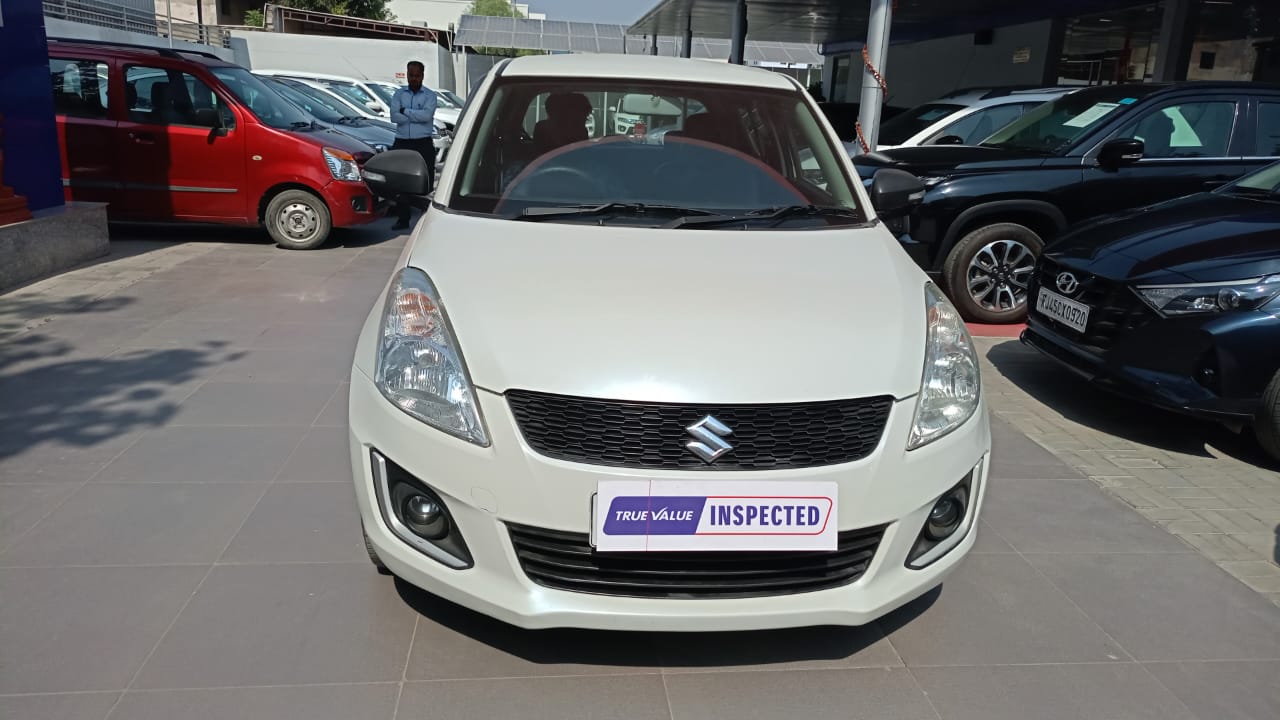 Maruti Suzuki Swift Lxi- White