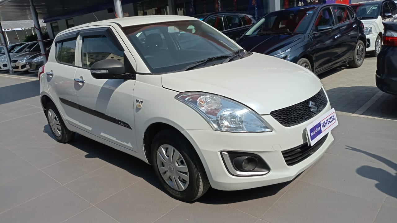 Maruti Suzuki Swift Lxi- White