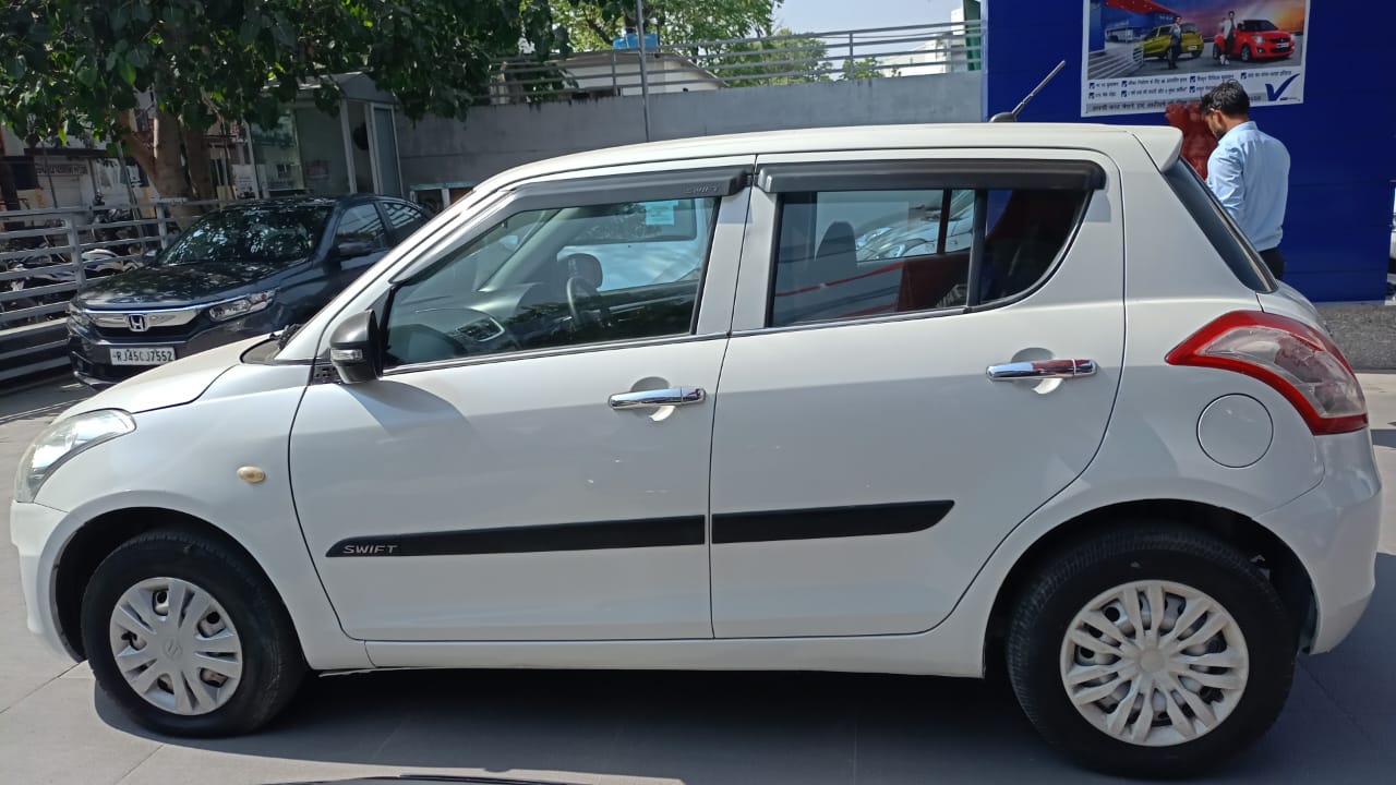 Maruti Suzuki Swift Lxi- White