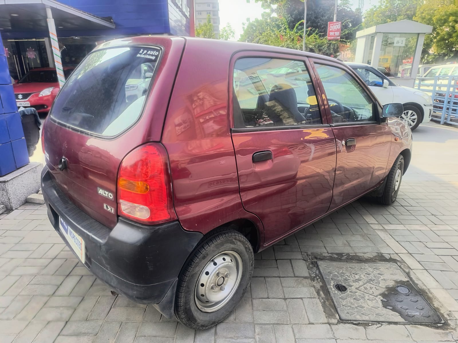 Maruti Suzuki - Alto LXI - Red