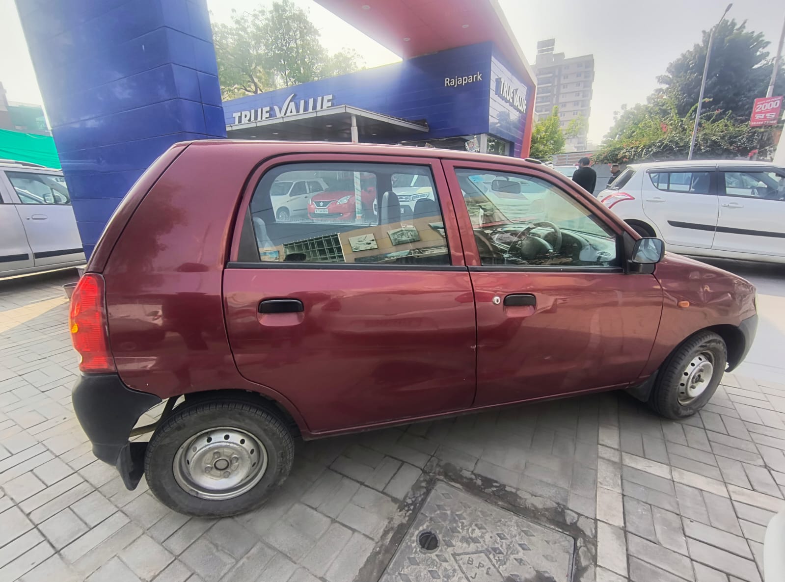 Maruti Suzuki - Alto LXI - Red