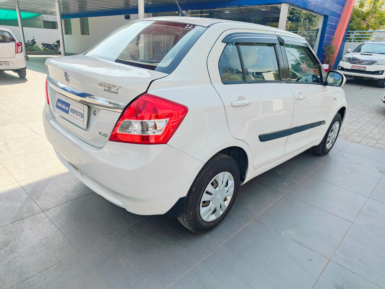 Maruti Suzuki - Dzire VXI - White